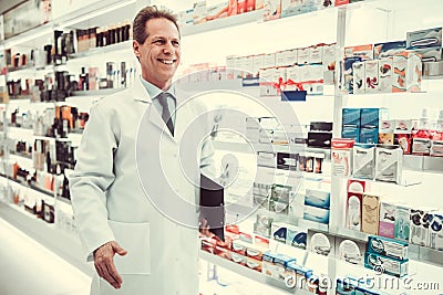 Handsome pharmacist working Stock Photo