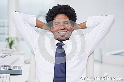 Handsome photo editor working at desk Stock Photo