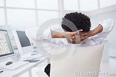 Handsome photo editor working at desk Stock Photo