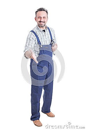 Handsome repairman or mechanic ready to handshake Stock Photo