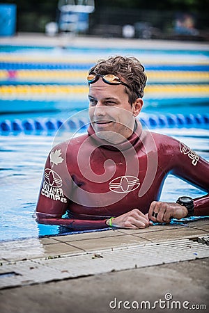 Handsome Safety Staff man Waiting the next Performer to Start. Editorial Stock Photo