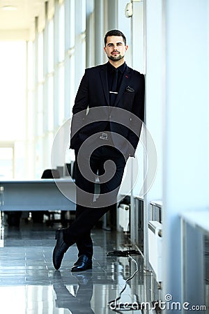 Handsome smiling confident businessman portrait Stock Photo