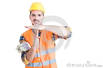 Handsome smiling engineer making a time out gesture with hands Stock Photo