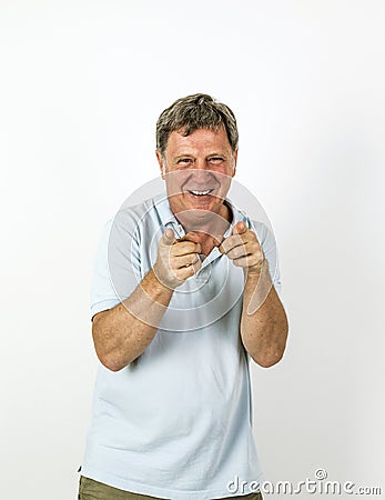 Handsome smiling man in blue leisure polo shirt Stock Photo