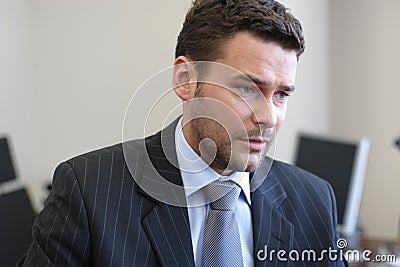 Handsome standing mature boss Stock Photo