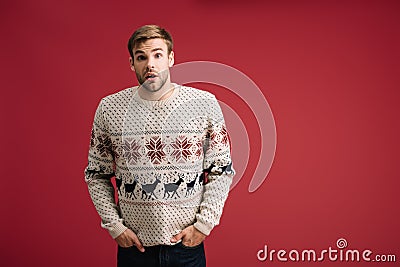 handsome surprised man posing in winter Stock Photo