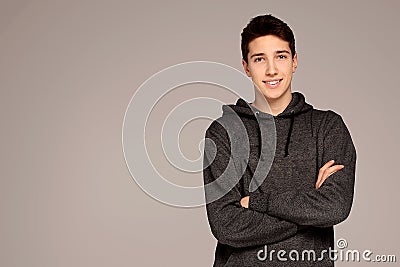 Handsome teenage boy in hoodie Stock Photo