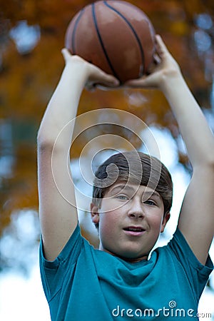 Handsome Teenager with Basketball Stock Photo