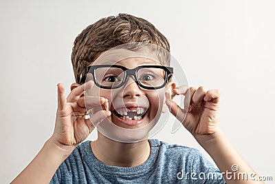 Handsome toothless boy with two fallen teeth Stock Photo