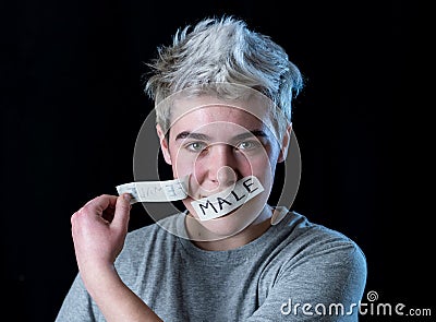Transgender teenager breaking the silence of his real gender identity Stock Photo