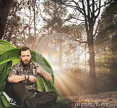 Handsome traveler near tent Stock Photo