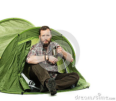 Handsome traveler in a tent Stock Photo