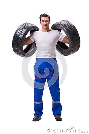 The handsome tyre repairman isolated on white Stock Photo