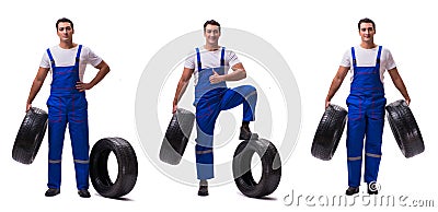 The handsome tyre repairman isolated on white Stock Photo