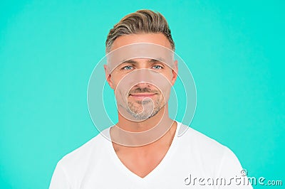 Handsome unshaven man. good looking guy with bristle on face. facial hair care. male grooming fashion. barbershop beauty Stock Photo