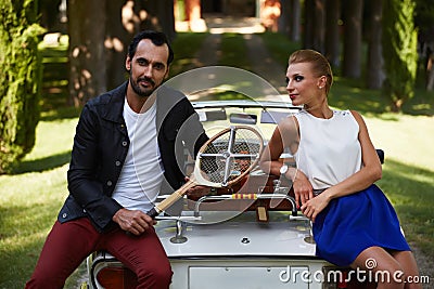 https://thumbs.dreamstime.com/x/handsome-wealthy-man-his-gorgeous-female-posing-outdoors-happily-married-couple-enjoying-beautiful-day-leaning-55424696.jpg