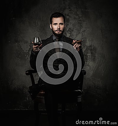 Handsome well-dressed with drink Stock Photo