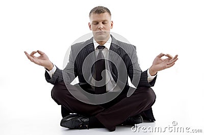 Handsome young executive practicing yoga Stock Photo