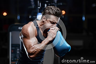 Handsome model young man workout in gym Stock Photo