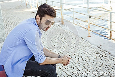 Handsome young man in bluejeans Stock Photo