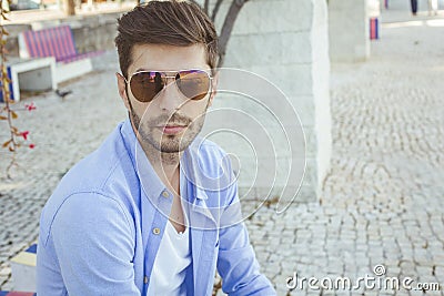 Handsome young man in bluejeans Stock Photo