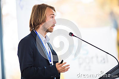 Handsome young man giving a speech Stock Photo