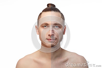 Handsome young man with half shaved face looking at camera Stock Photo