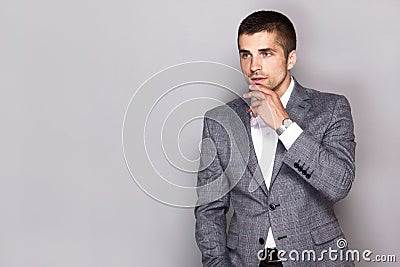 Handsome young man wears a watch Stock Photo