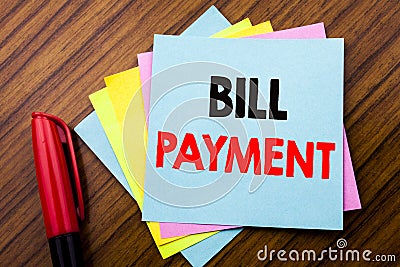 Handwriting Announcement text Bill Payment. Concept for Billing Pay Costs Written on sticky stick note paper with wooden backgrou Stock Photo