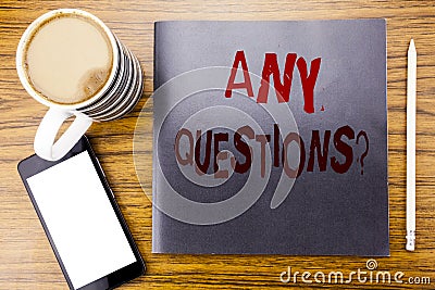 Handwriting Announcement text showing Any Questions. Business concept for Answer Help Question Written on notepad note paper, wood Stock Photo