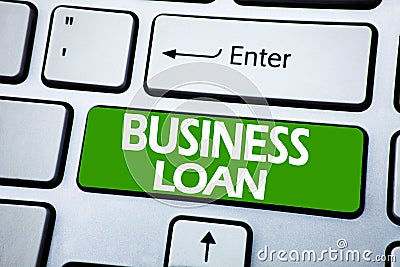 Handwriting Announcement text showing Business Loan. Business concept for Lending Finance Credit written on blue key on the keybor Stock Photo