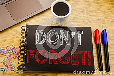 Handwriting Announcement text showing Do Not Forget. Business concept for Reminder Message written on notebook book on the wooden Stock Photo