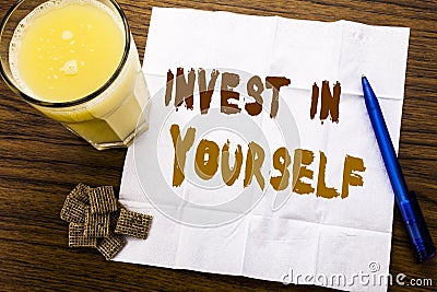 Handwriting Announcement text showing Invest In Yourself. Business concept for Self Motivation written on tissue paper on the wood Stock Photo