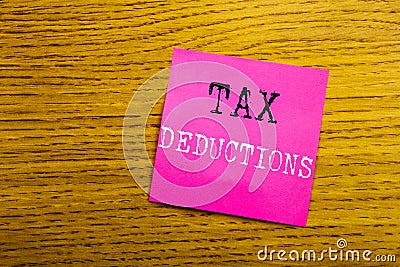 Handwriting Announcement text showing Tax Deductions. Business concept for Finance Incoming Tax Money Deduction written on sticky Stock Photo