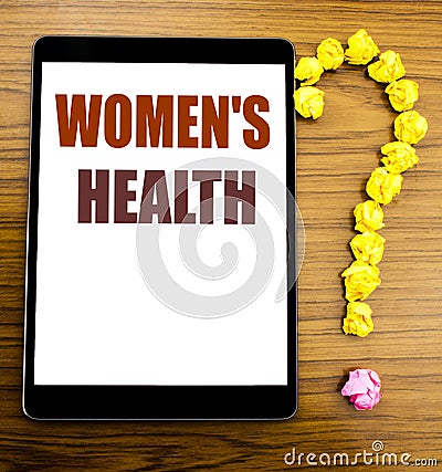 Handwriting Announcement text showing Women s Health. Business concept for Female Celebration Written on tablet with wooden backg Stock Photo