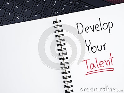 Handwriting Develop Your Talent on laptop keyboard Stock Photo