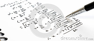 Handwriting of mathematics quadratic equation formula on examination, practice, quiz or test in math class. Stock Photo