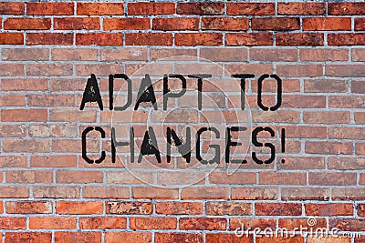 Handwriting text Adapt To Changes. Concept meaning Innovative changes adaption with technological evolution Brick Wall Stock Photo