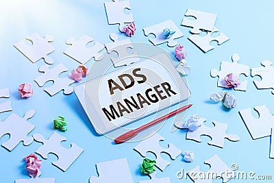 Handwriting text Ads Analysisager. Business overview oversee and control the various advertising activities Stock Photo