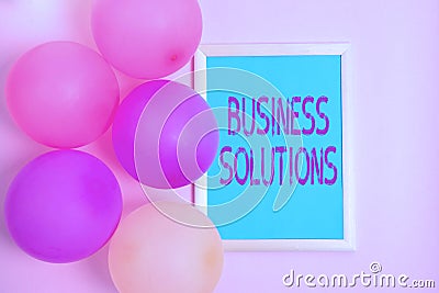 Writing displaying text Business Solutions. Business concept ideas used to help a company achieve its objectives Stock Photo