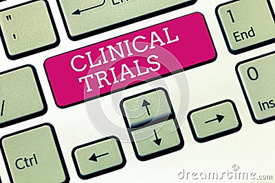 Handwriting text Clinical Trials. Concept meaning Research investigation to new treatments to showing Stock Photo