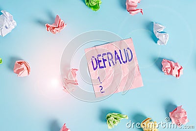 Handwriting text Defraud. Concept meaning to trick or cheat someone or something in order to get money Colored crumpled rectangle Stock Photo