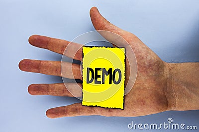 Handwriting text Demo. Concept meaning Demonstration of products by software companies are displayed annually written on Yellow St Stock Photo
