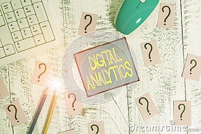 Handwriting text Digital Analytics. Concept meaning the analysis of qualitative and quantitative data Writing tools, computer Stock Photo