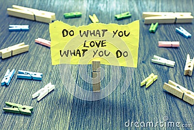 Handwriting text Do What You Love What You Do. Concept meaning Make things that motivate yourself Passion Paperclip hold written t Stock Photo