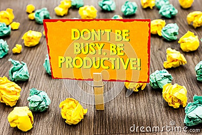 Handwriting text Don t not Be Busy. Be Productive. Concept meaning Work efficiently Organize your schedule time Paperclip hold wri Stock Photo