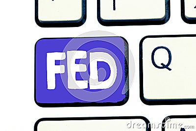 Handwriting text Fed. Concept meaning A federal agent and official especially a member of the FBI Reserve army Stock Photo