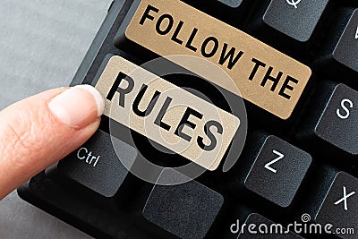 Handwriting text Follow The Rules. Internet Concept learn to conform the compliance, regulations, or guidelines Typing Stock Photo