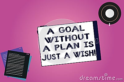 Handwriting text A Goal Without A Plan Is Just A Wish. Concept meaning Make strategies to reach objectives Tablet Empty Stock Photo