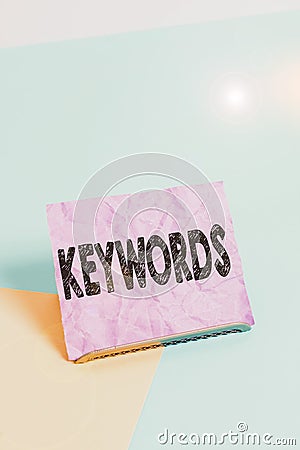 Handwriting text Keywords. Concept meaning word which acts as the key to a code Concept of great significance Paper placed tilted Stock Photo